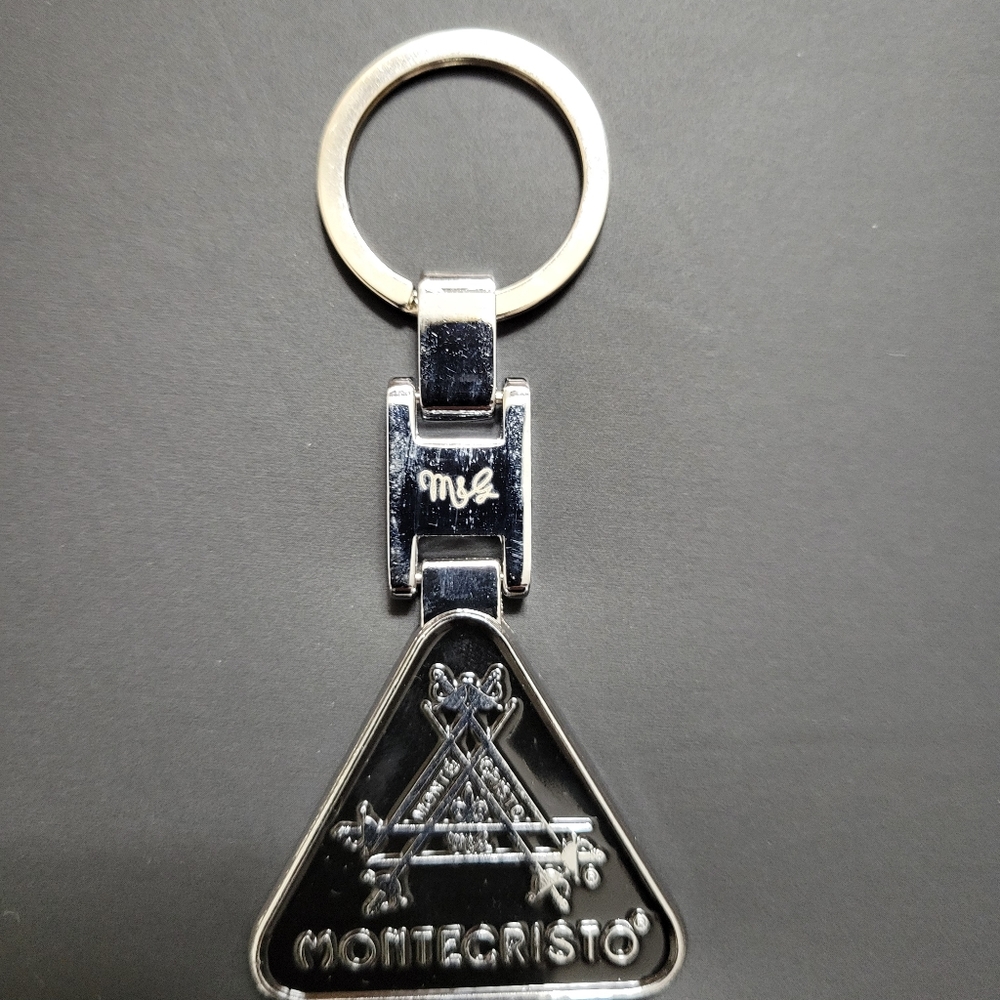 MONTECRISTO Key Chain, NWOT, black on faux silver, somewhat heavy. - Picture 2 of 3